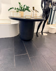 CB2 Lola Round Black Concrete Dining Table